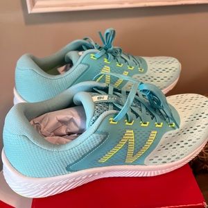 Women’s size 11 New Balance running shoes. Teal. Brand new in box.